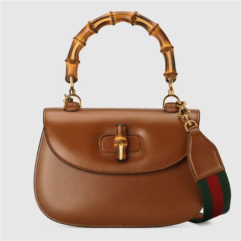 gucci lady xxv ottilia bamboo handle bag|Gucci Bamboo 1947 Collection .